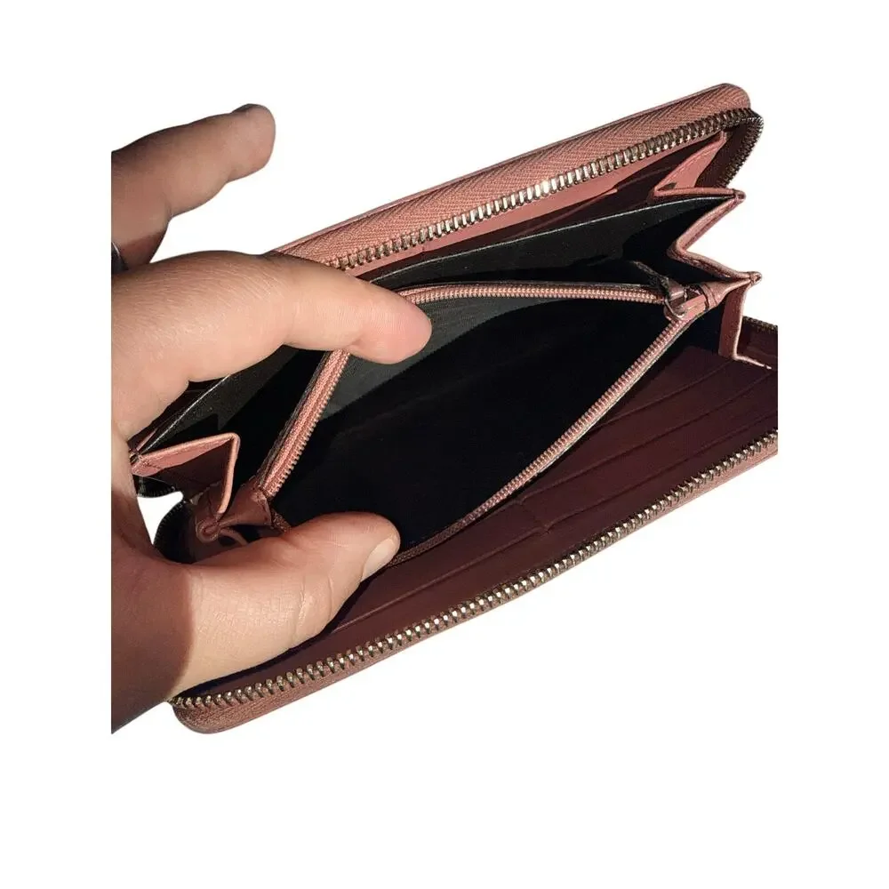 Gucci Guccissima Zip Around Wallet in Mauve Pink